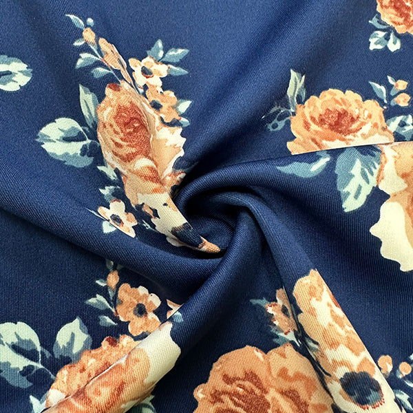 Scuba Knit Navy and Peach Multi Floral Print 96% Polyester 4% Spandex Sold by The Yard
