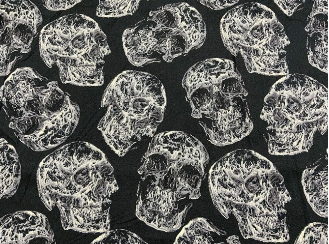 45” Wide Chaos Skulls with Black Background 100% Cotton Sold By The Yard