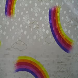 45" China Silk 100% Polyester Rainbows with Pink Background