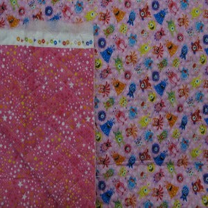 44” Wide 100% Cotton Pre-Quilted Fabric by The Yard with Poly Batting Launch Party on one Side and Sky Design on Other Side
